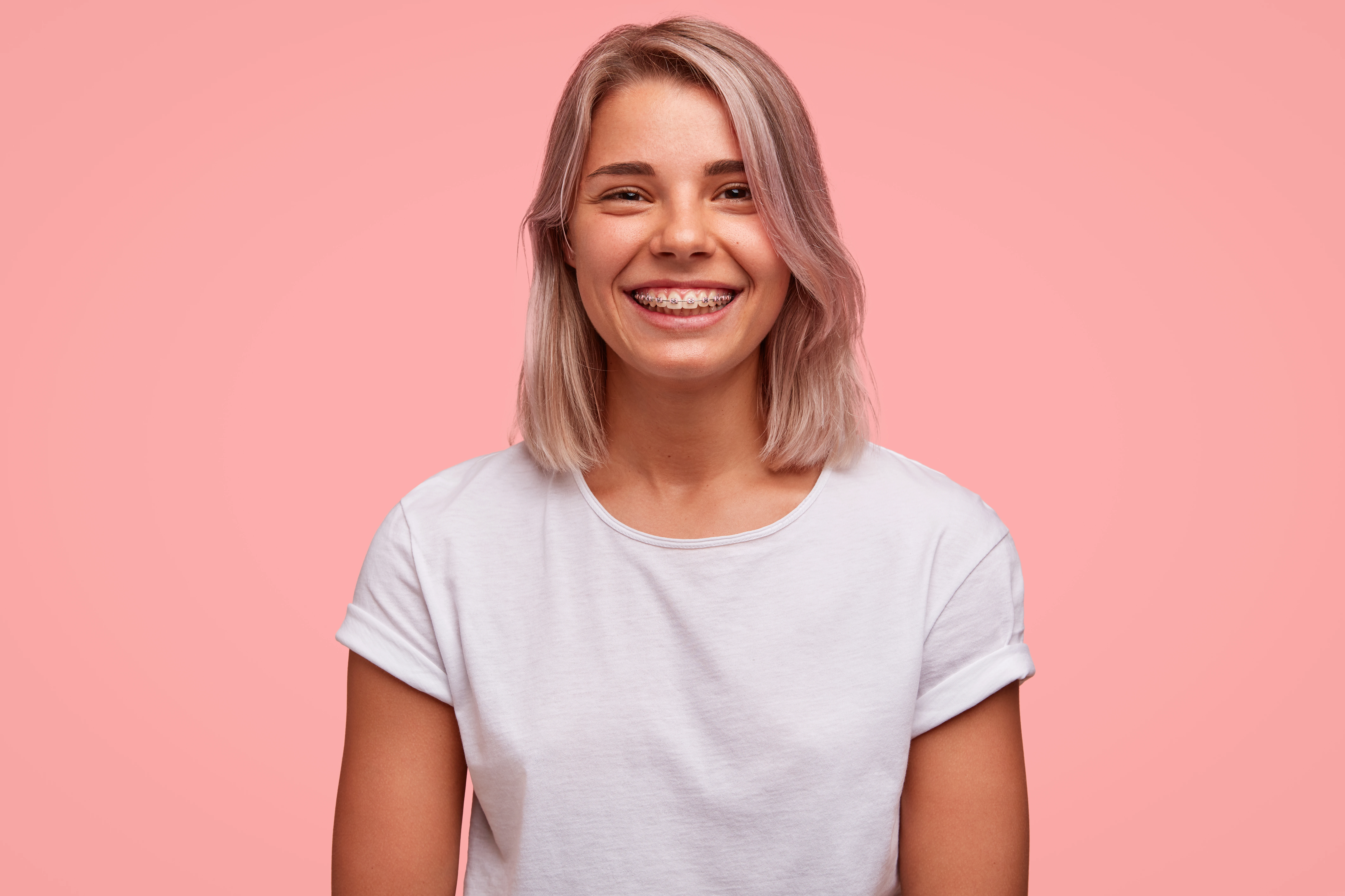 Patient smiling with braces